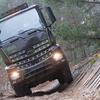 Mercedes-Benz Arocs lastbil i kamouflage.